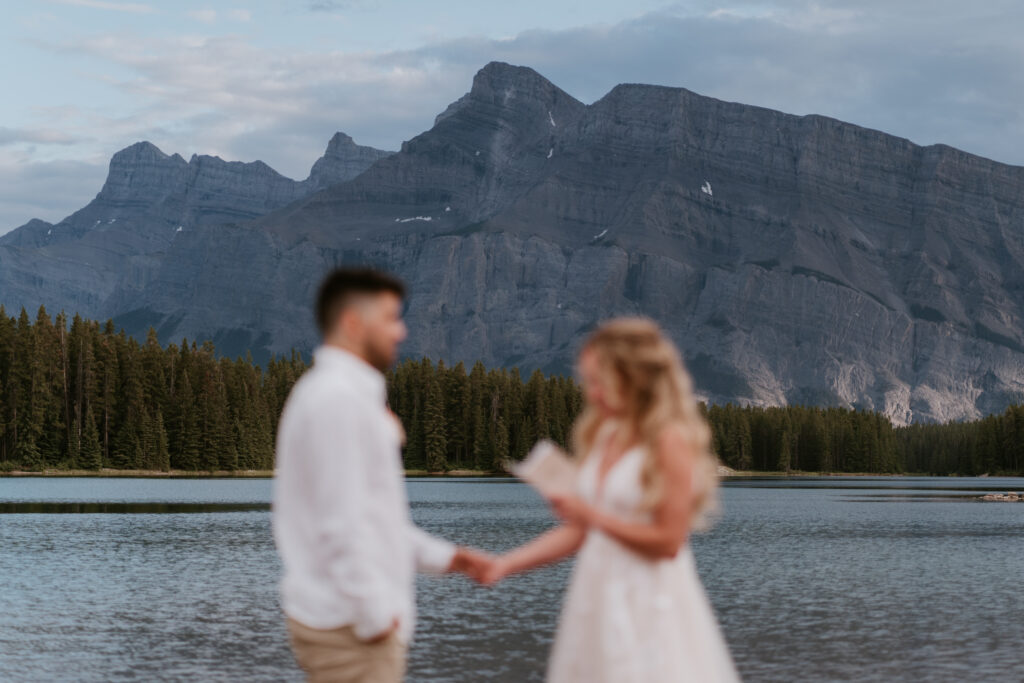 Couple says their vows at Two Jack Lake in Banff National Park