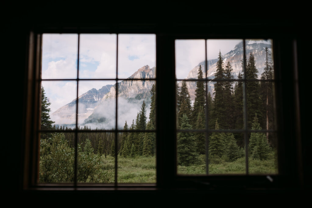 looking out the window of shadow lake lodge at the mountains