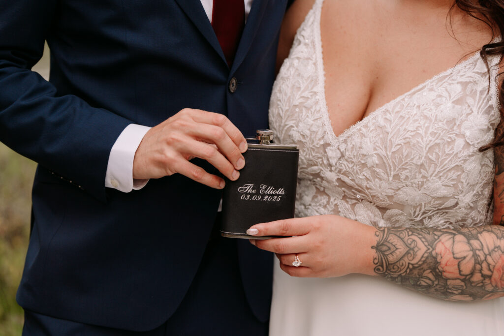 custom flask with couples name and date for their elopement