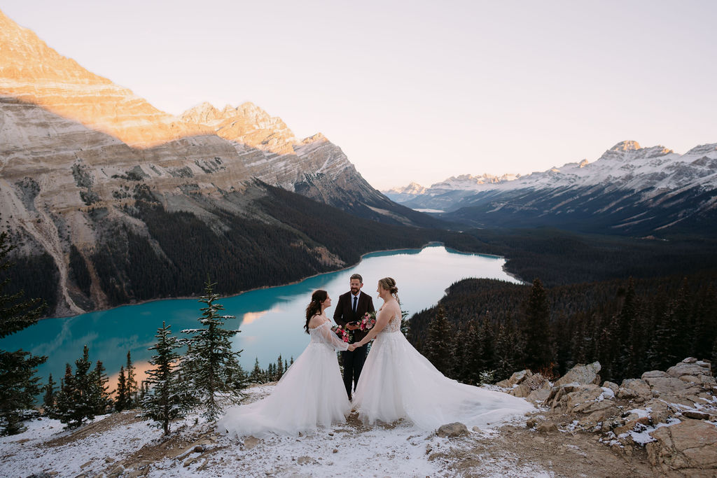 sunrise ceremony between two brides at peyto lake