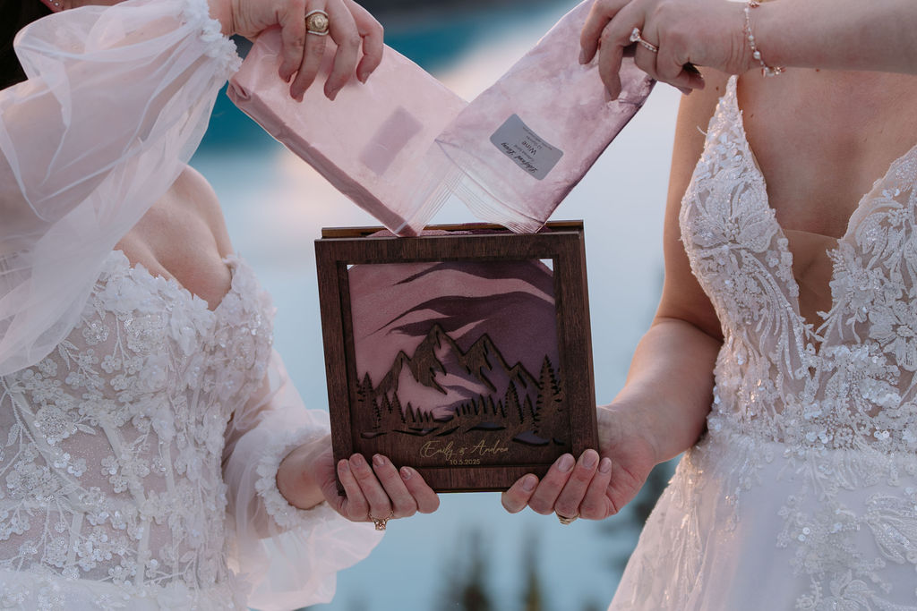 sand ceremony between two brides